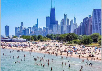 Event-5 Crowded beach with city skyline background